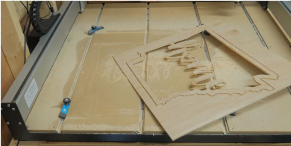 Wooden sign project using CA glue in the shop