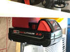 Milwaukee M18 battery holder mounted for storage